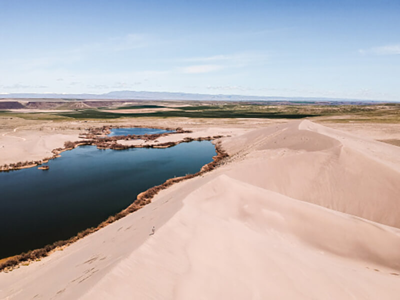 An oasis with deep blue water